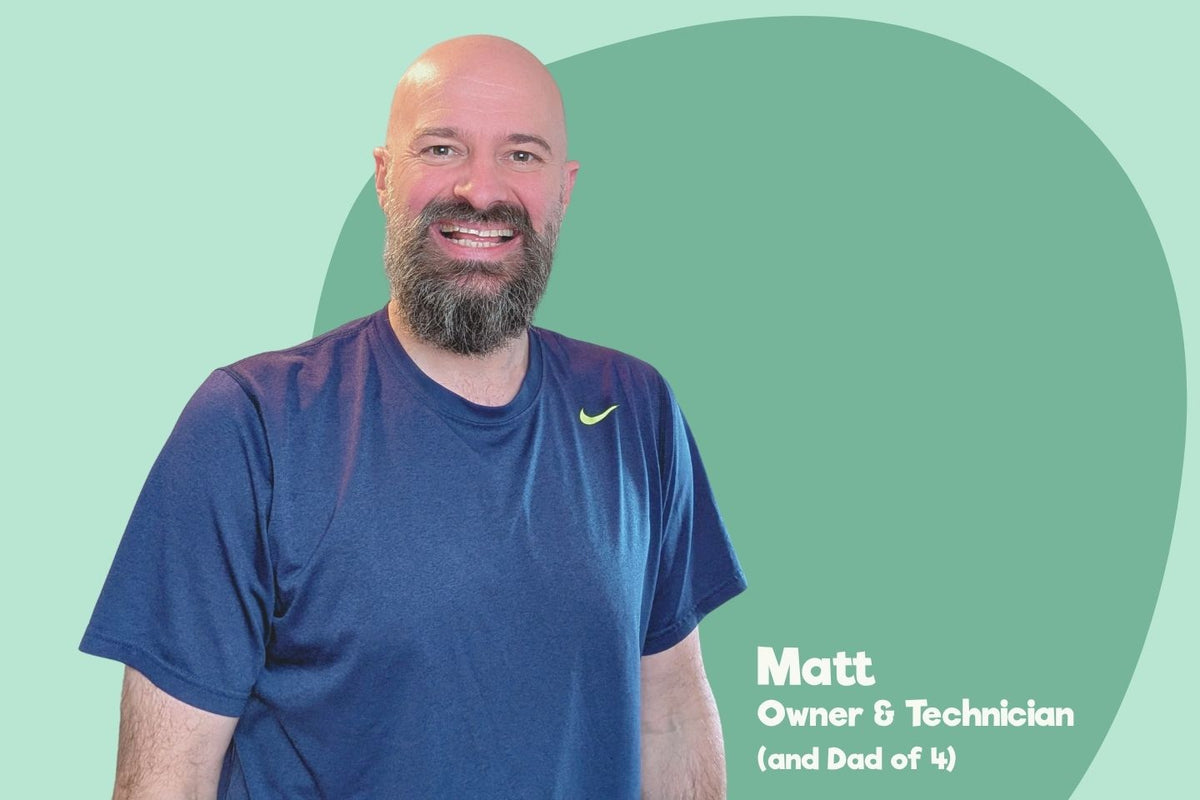 Man with a beard wearing a blue Nike shirt on a green background with text.  overlay. Friendly conversion service.